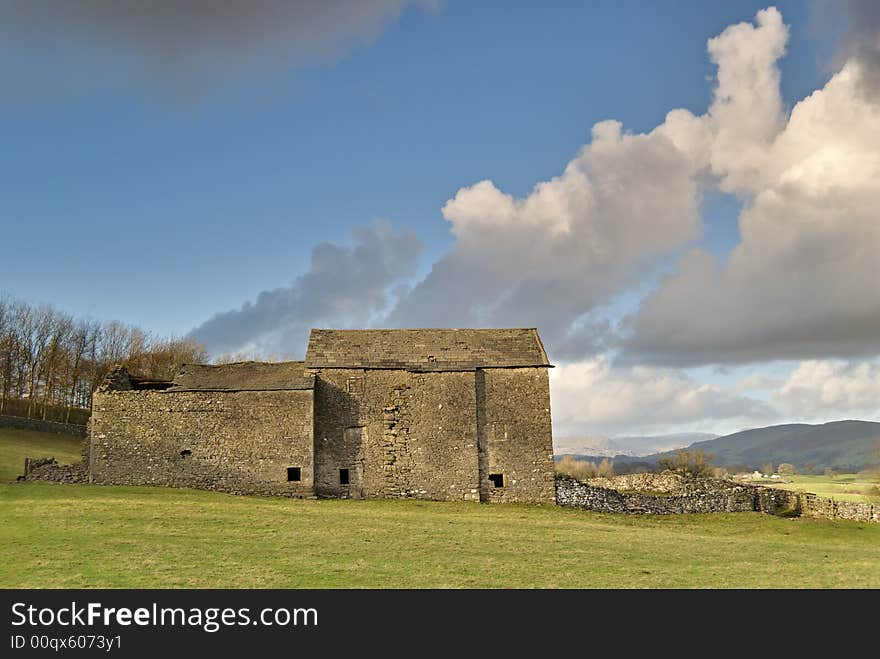 A ruined Lake District barn with Cumulus clouds. A ruined Lake District barn with Cumulus clouds