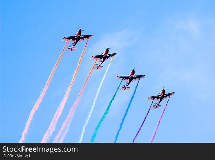 Four plane display different color of smoke during their show at he Al Ain Aerobatic Show 2008. Four plane display different color of smoke during their show at he Al Ain Aerobatic Show 2008