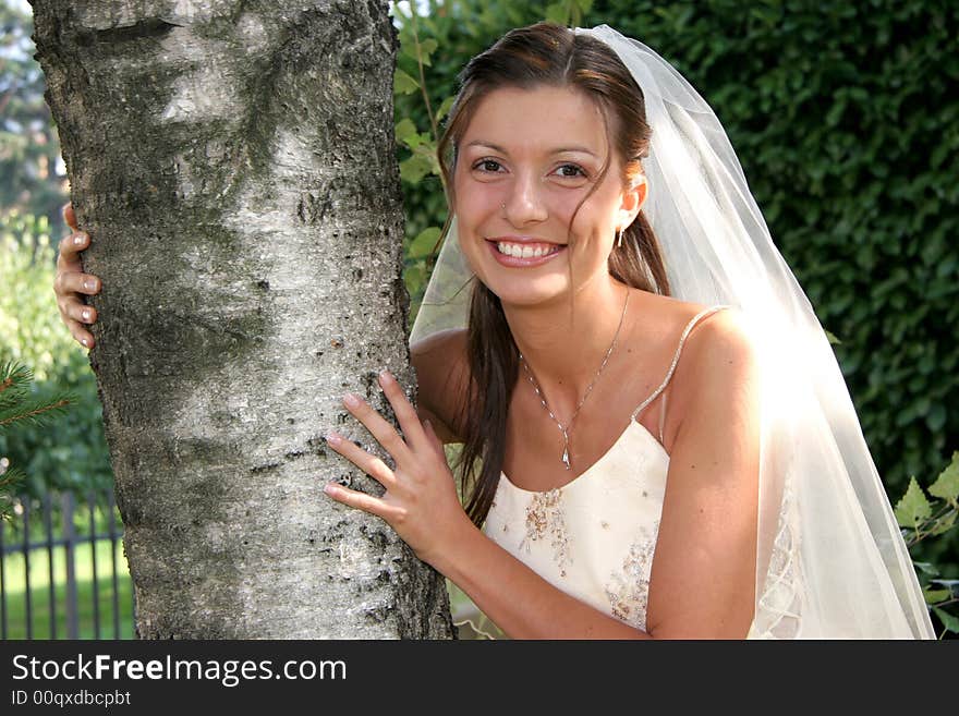 Young bride posing in the wedding day. Young bride posing in the wedding day