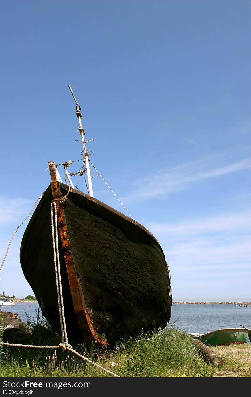 Old fishing boat on the shore