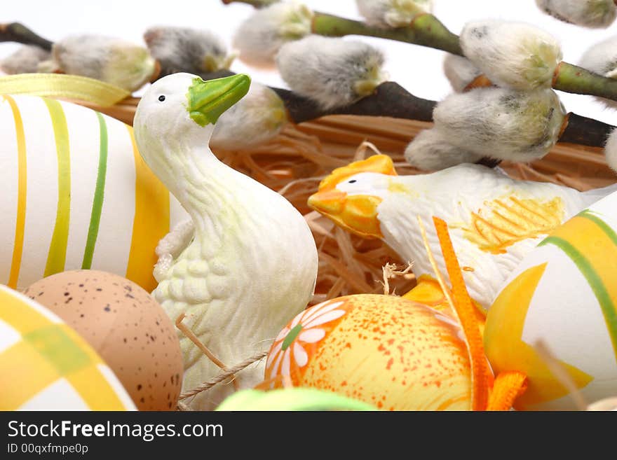 Easter decoration - goose, chick and eggs in a basket