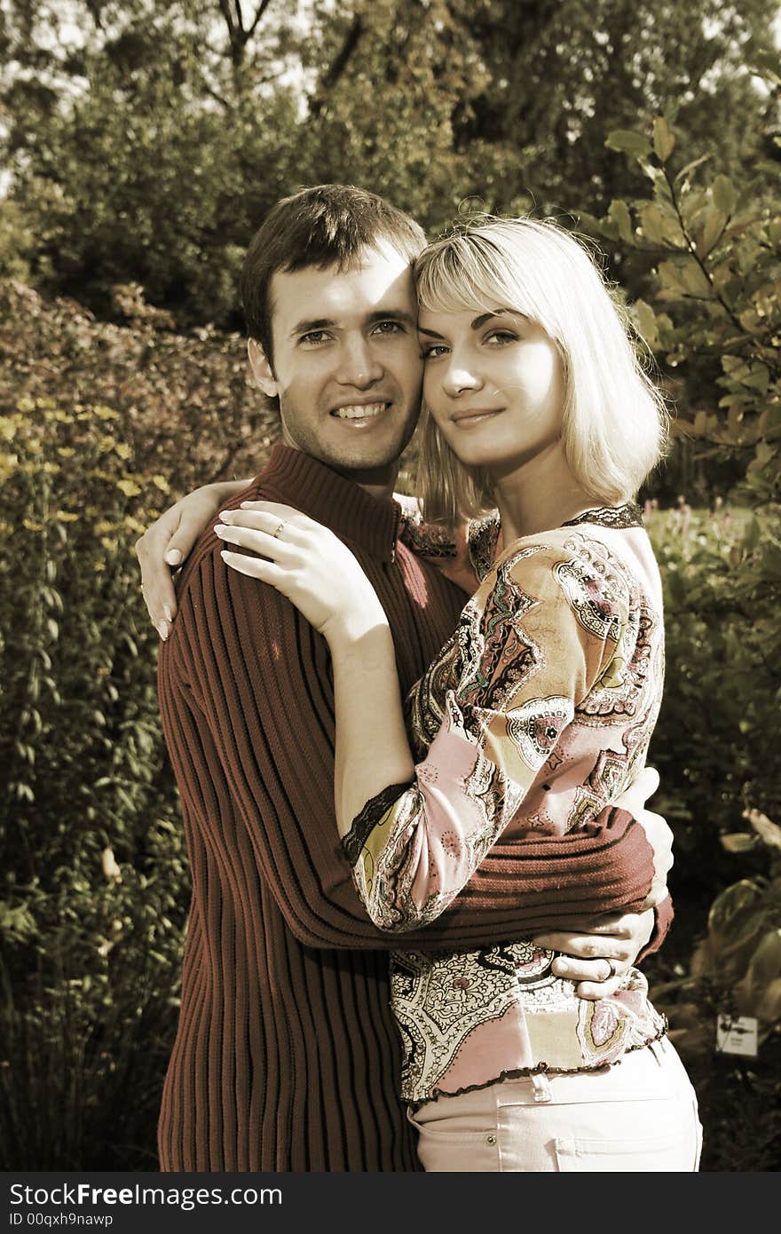 Young beautiful couple in the forest(sepia). Young beautiful couple in the forest(sepia)