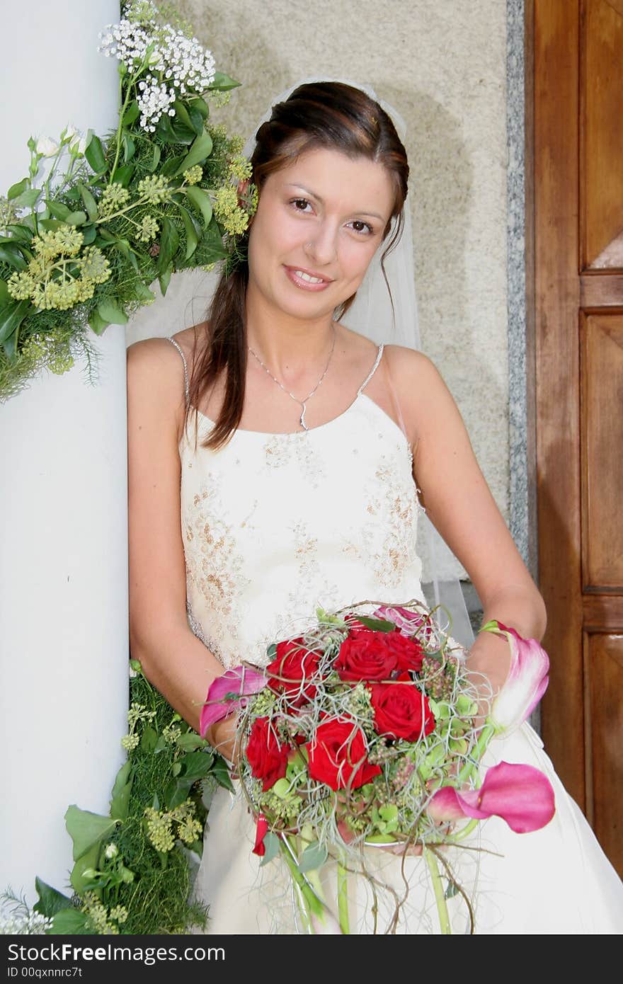 Young bride posing in the wedding day. Young bride posing in the wedding day