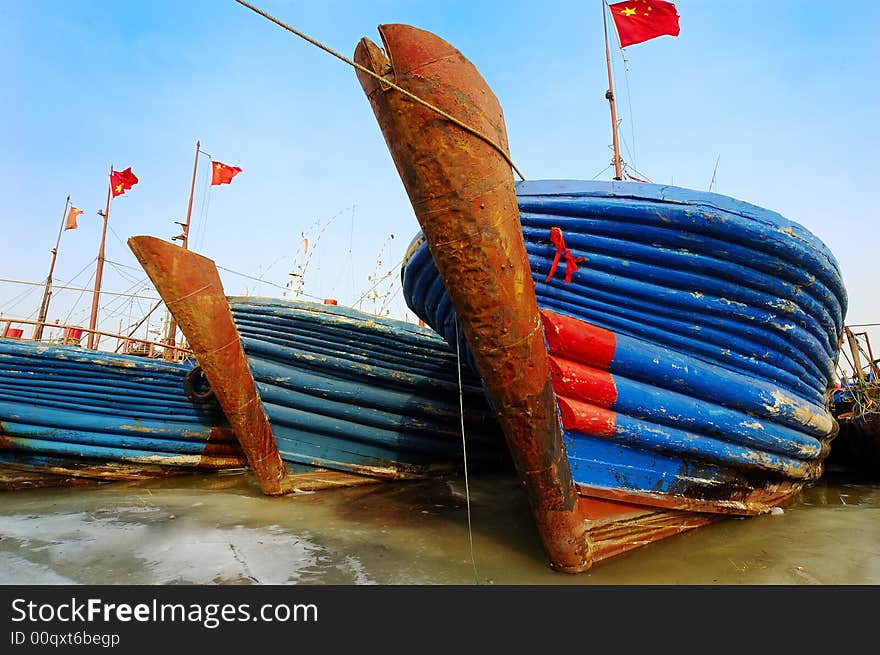 Fishing boat are at anchor in winter