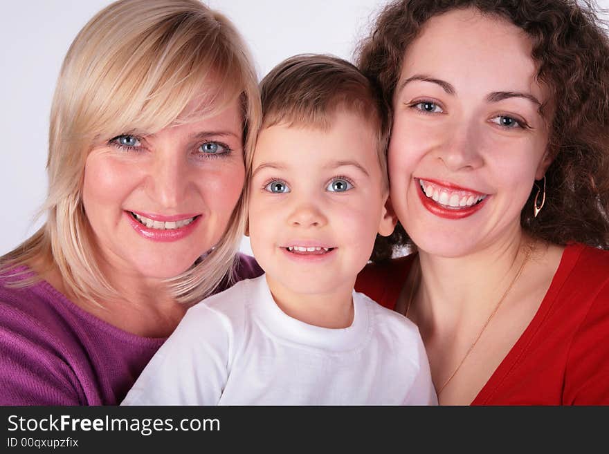 Grandmother, mother, baby on light background