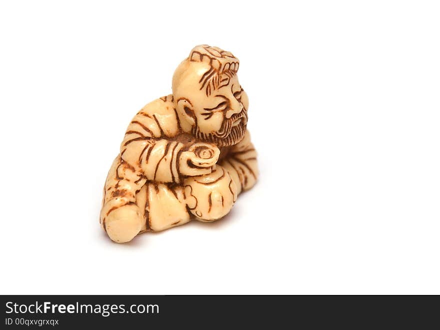 Oriental figurine of old man on the white background. Oriental figurine of old man on the white background