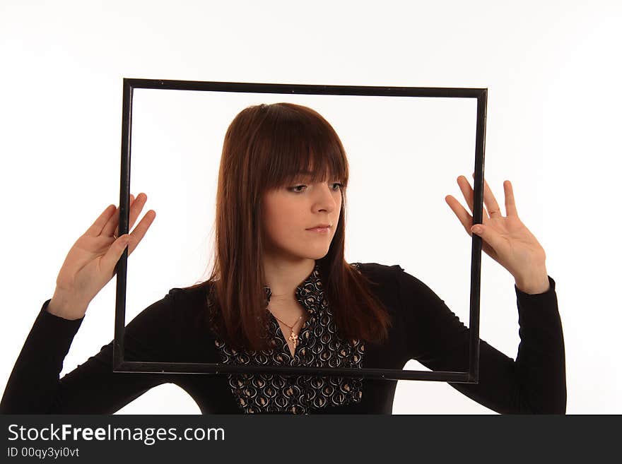 Portrait of the girl with a framework on a white background