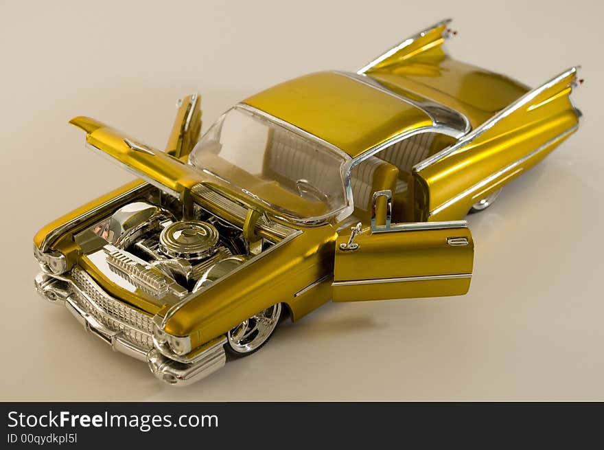 Picture of a miniature replica of a toy car. Picture of a miniature replica of a toy car