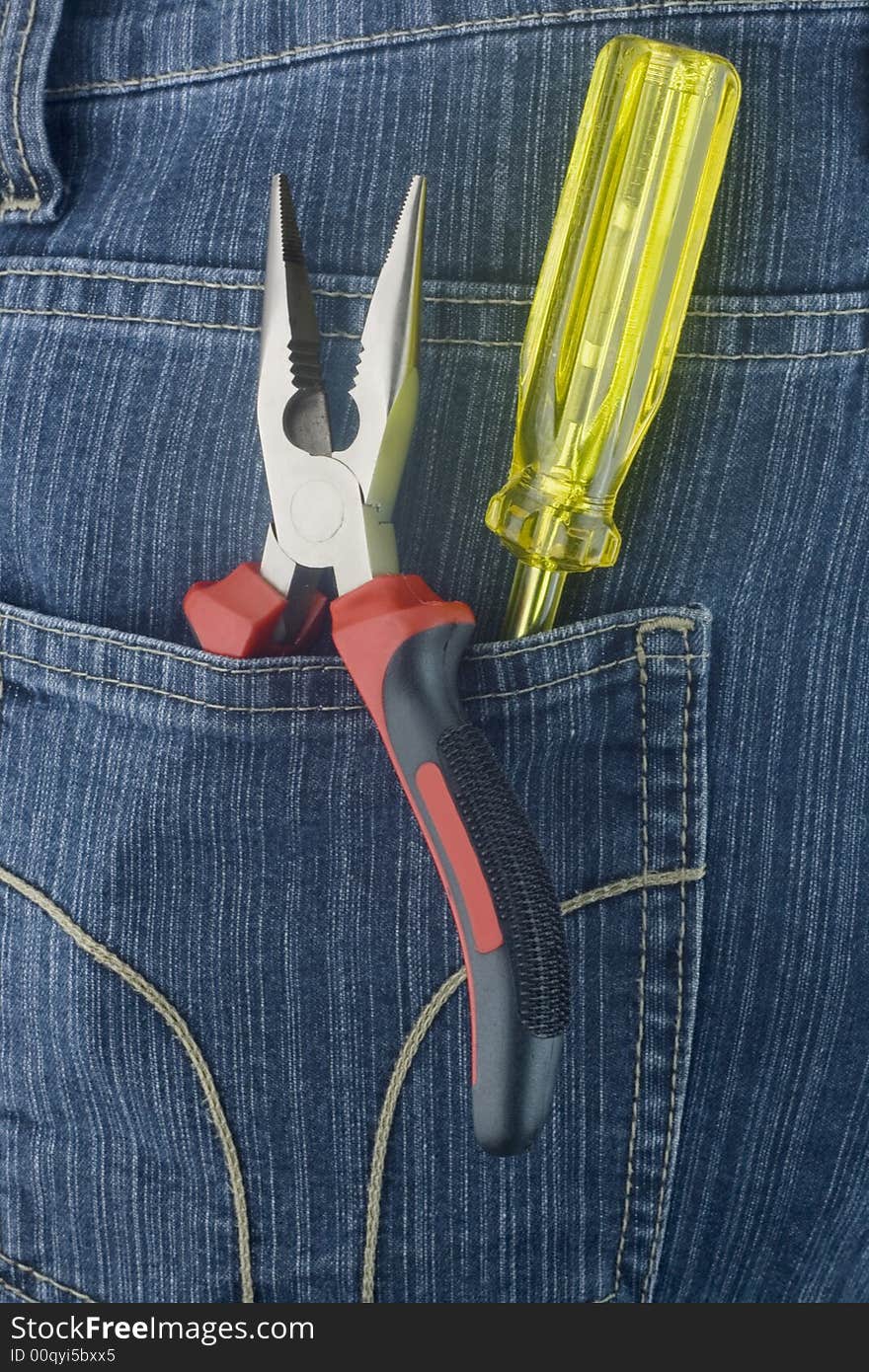 Red pliers and yellow screwdriver