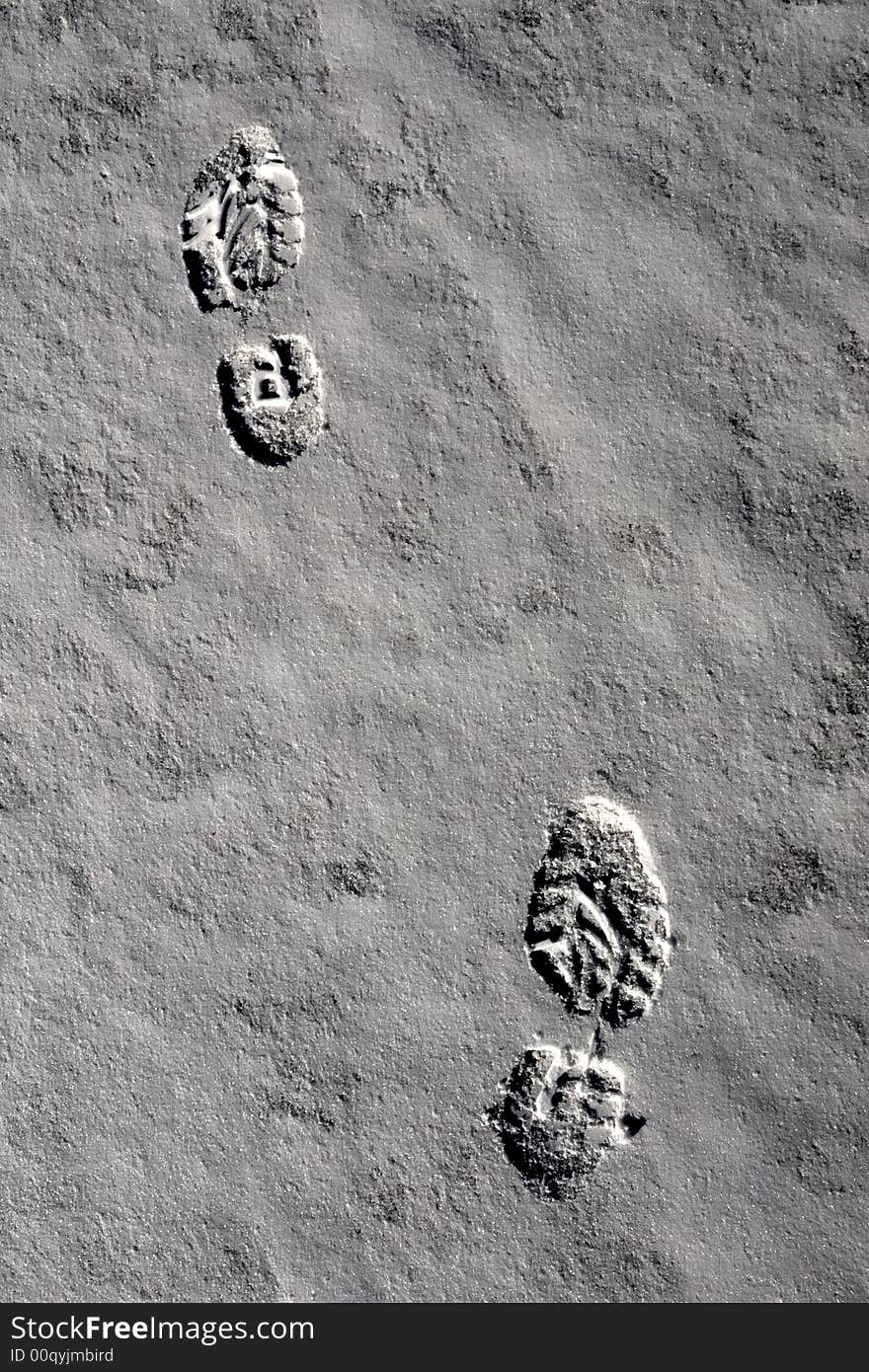 Footsteps in the snow on a frozen lake. Footsteps in the snow on a frozen lake