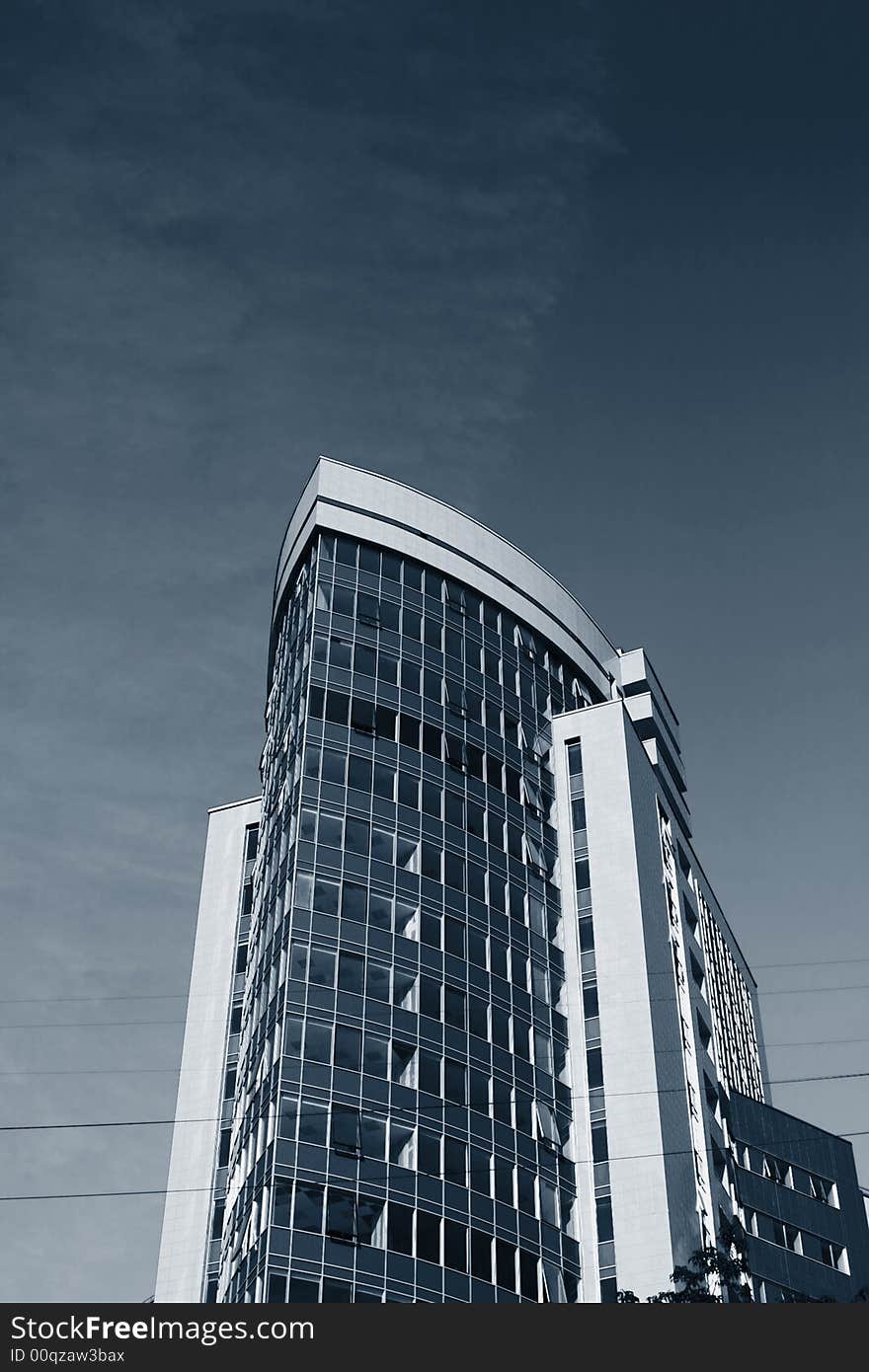 Modern office building over blue sky. Modern office building over blue sky.