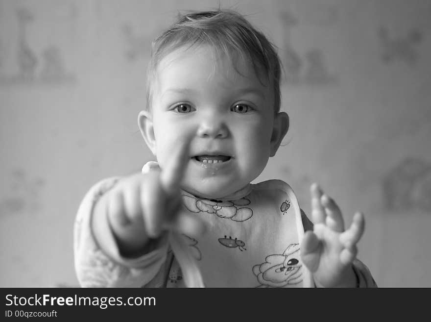 An image of baby in the kitchen. An image of baby in the kitchen.