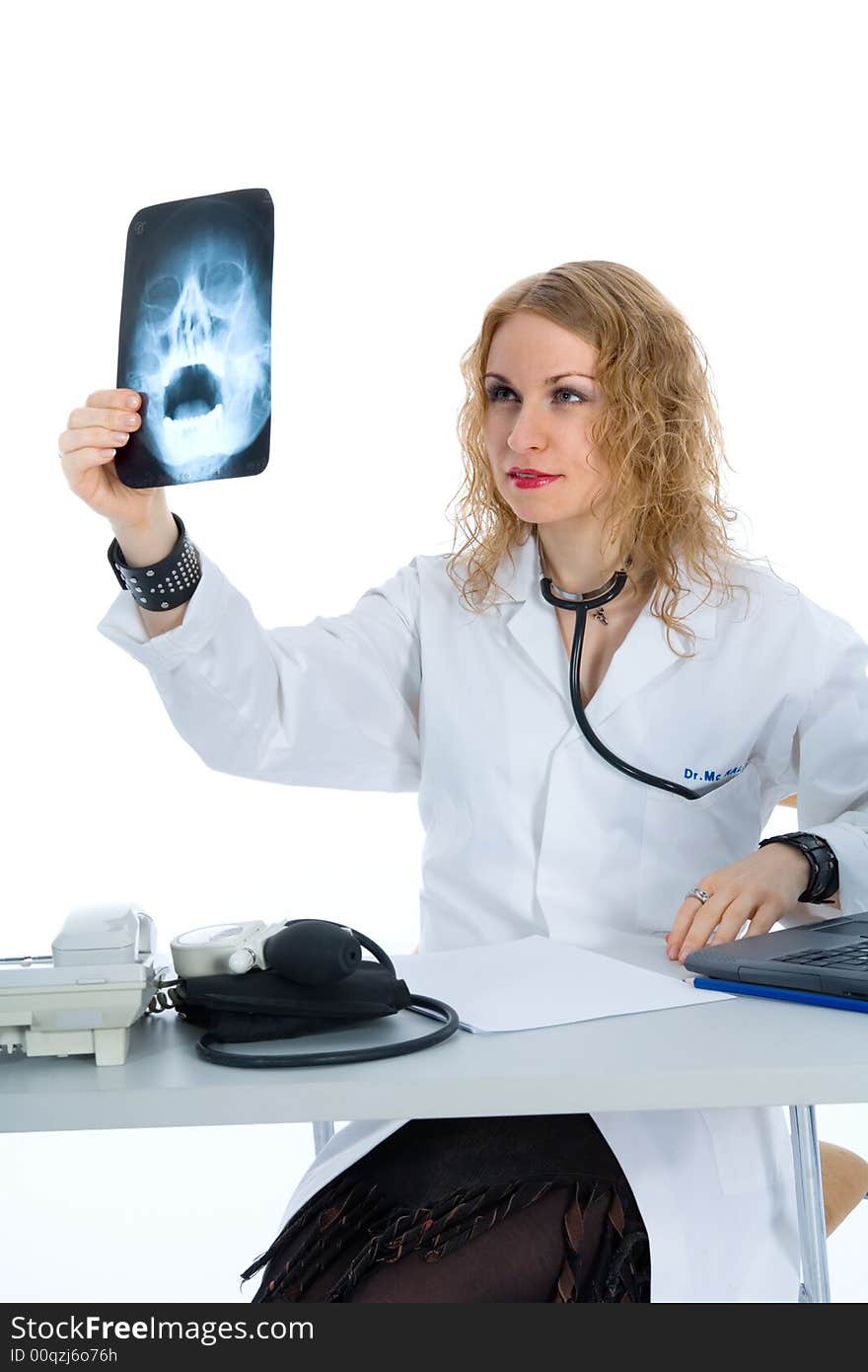 Young doctor with stethoscope on isolated background