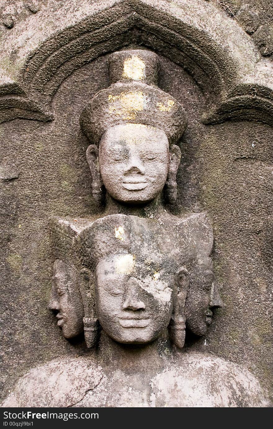 Hindu temple wall carving in temple ruins