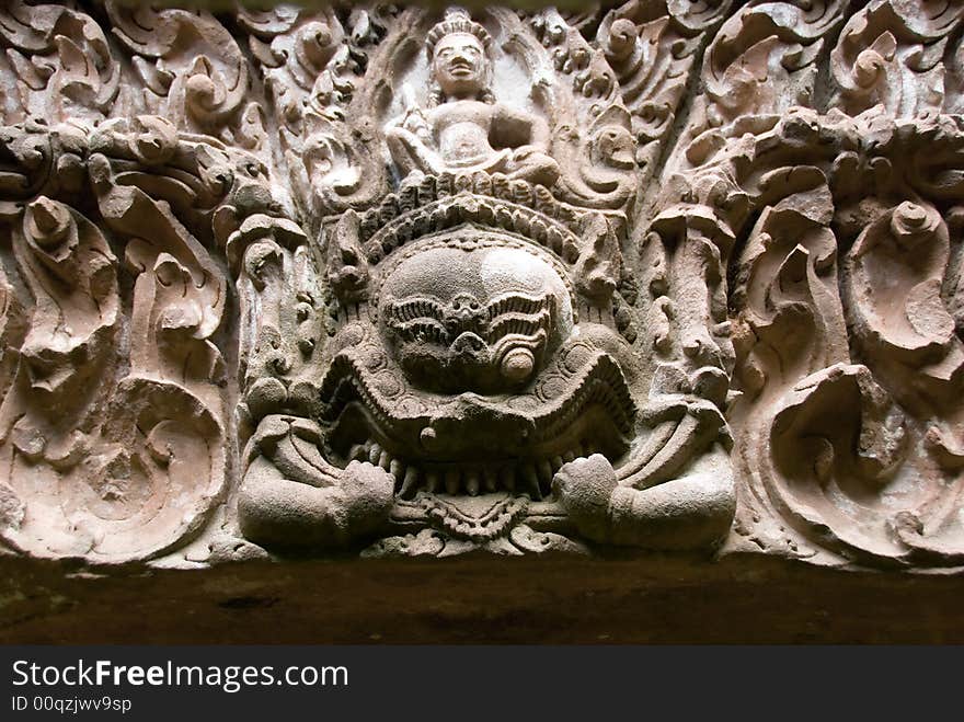 Hindu temple wall carving in temple ruins