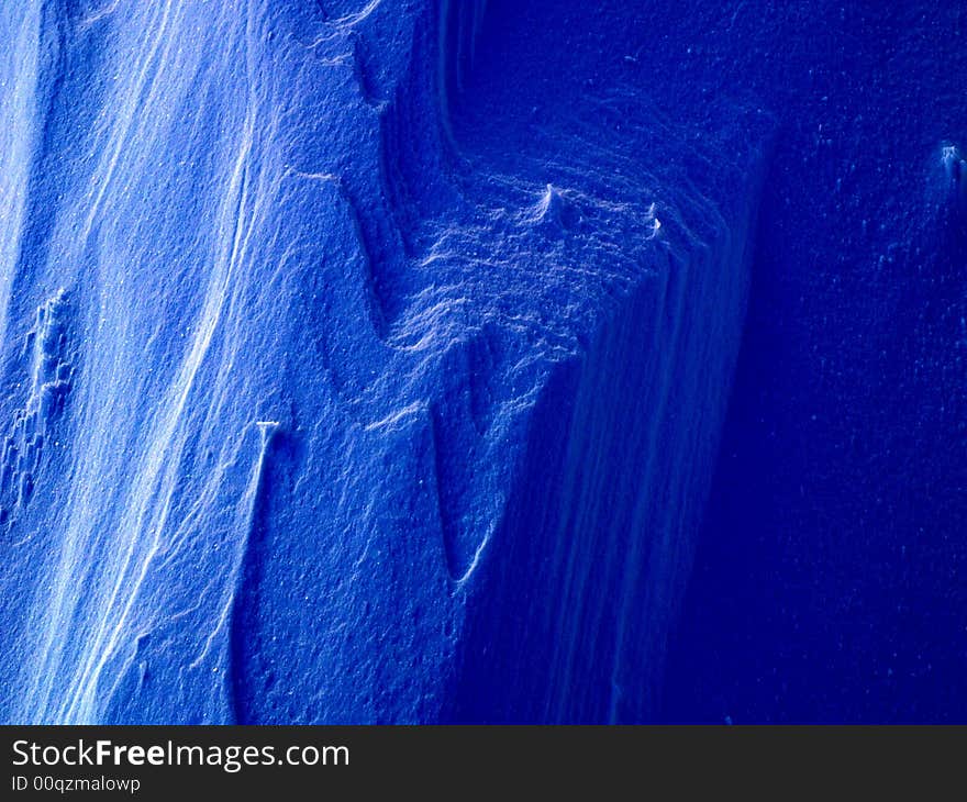 Frozen snow background in blue. Frozen snow background in blue.