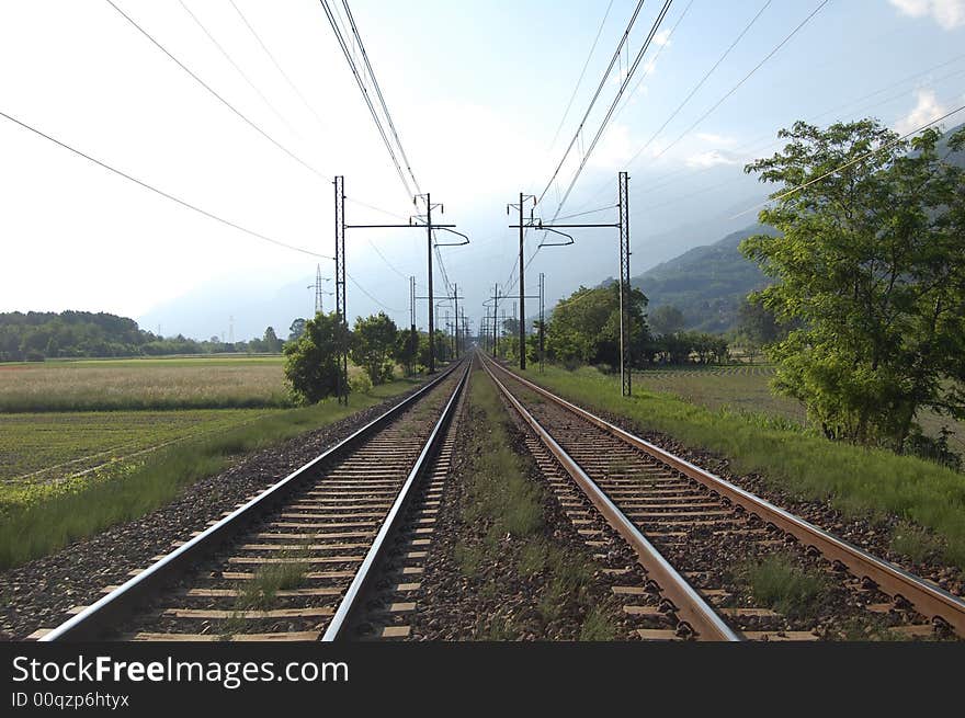 Tracks among among meadows and fields during the Spring