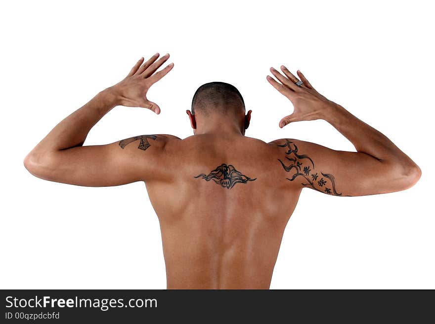 Young man showing his muscles and his tattooed back - isolated over white!. Young man showing his muscles and his tattooed back - isolated over white!