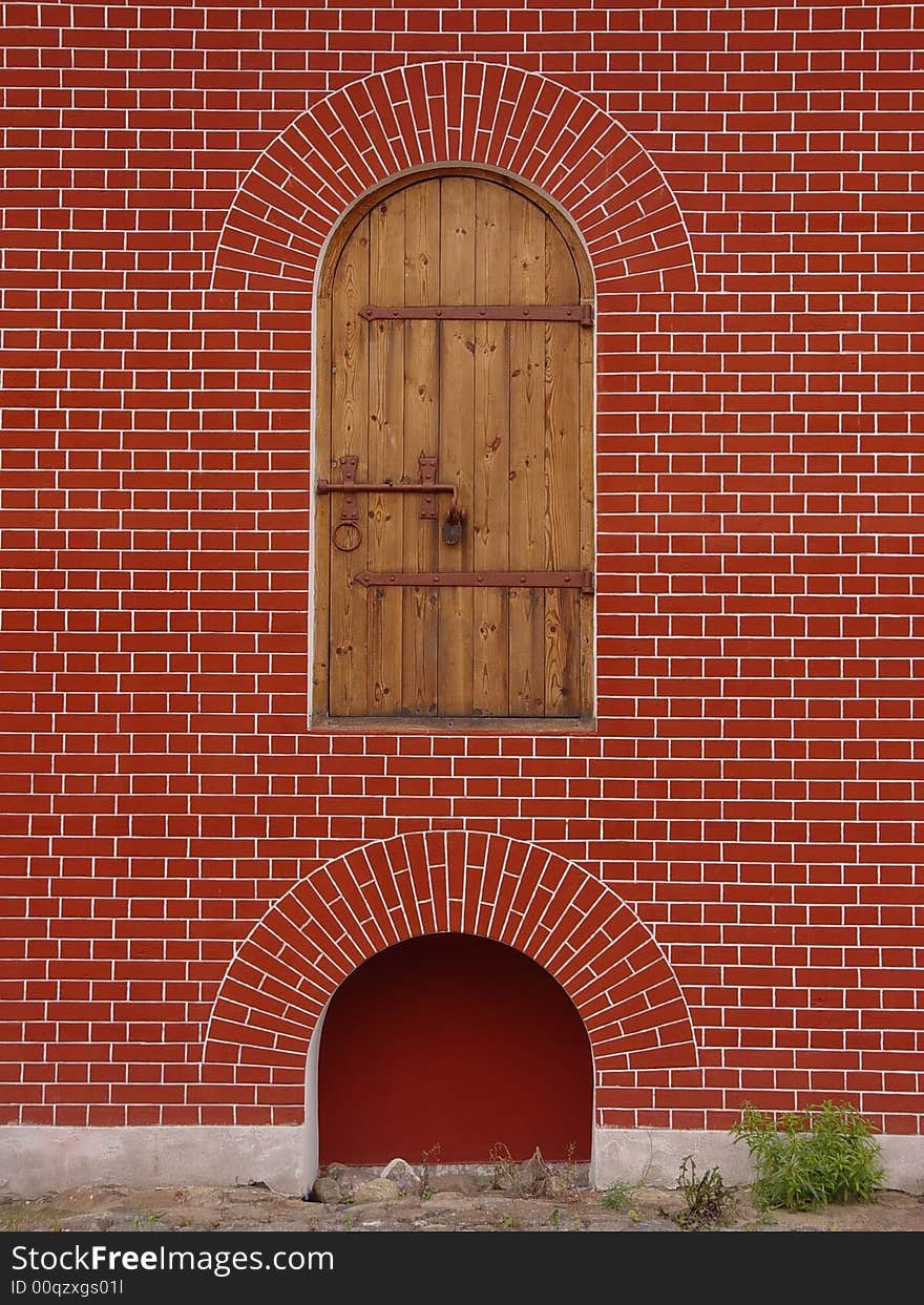 Lonely door in wall, over ground