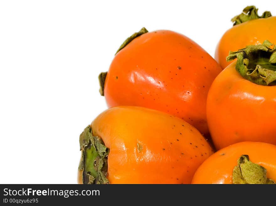 Fresh persimmon on white isolated background