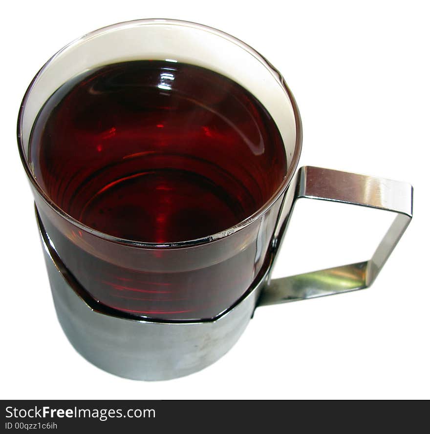 Black tea in glass on white background