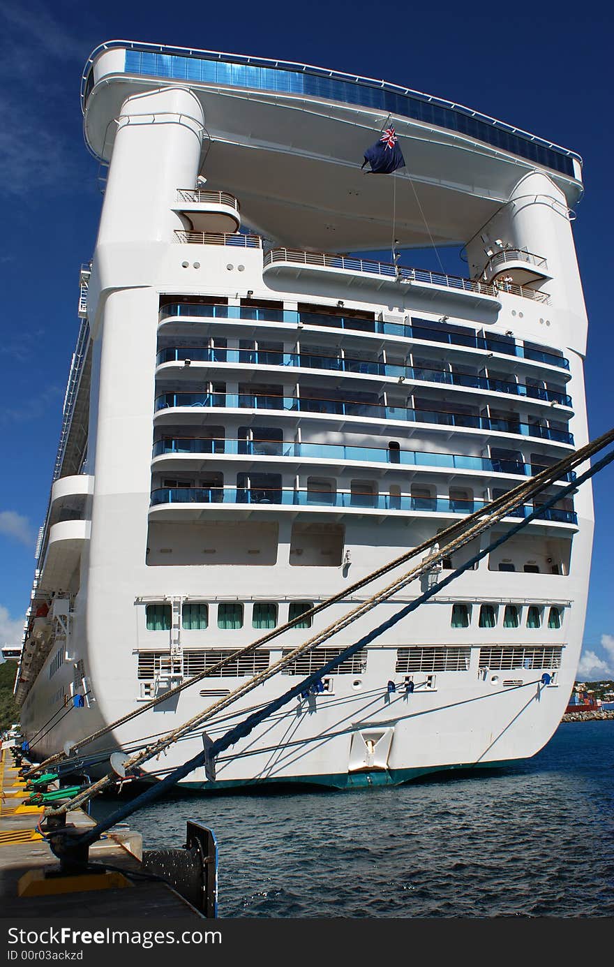 Enormous cruise liner in Philipsburg port, St. Maarten island, N.A. Enormous cruise liner in Philipsburg port, St. Maarten island, N.A.