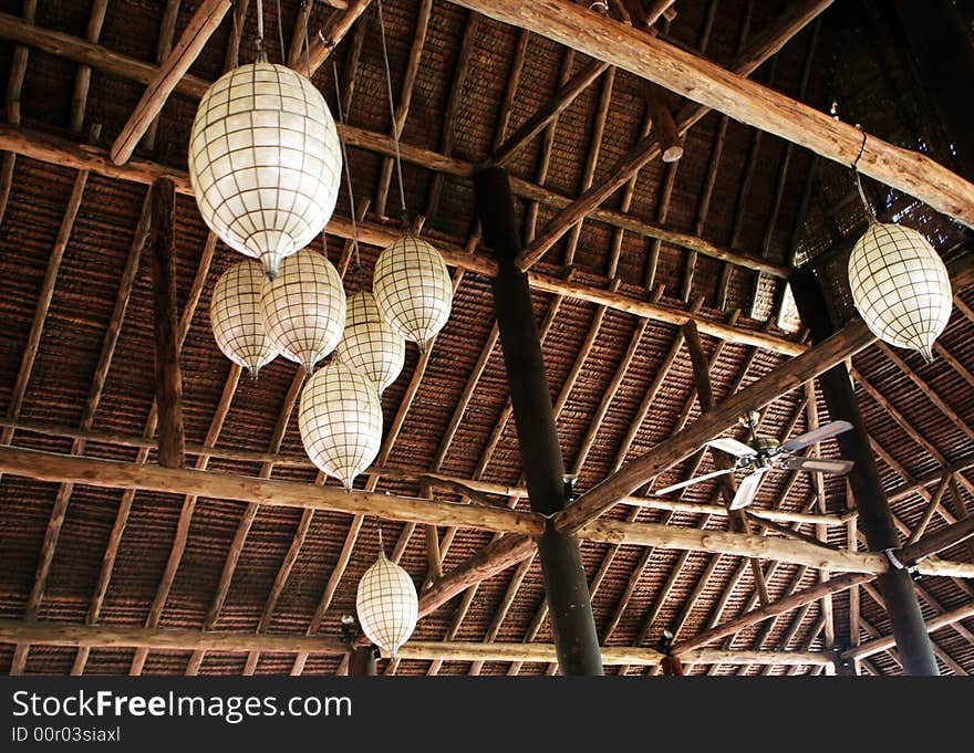 Asian style lights hanging from a ceiling - home interiors.