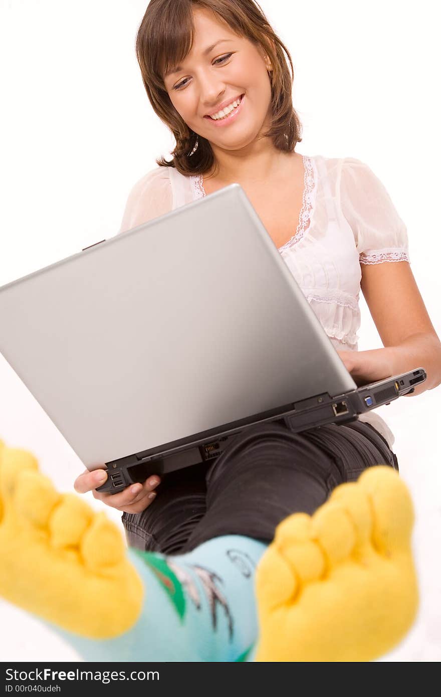 Confident smiling girl with laptop close-up