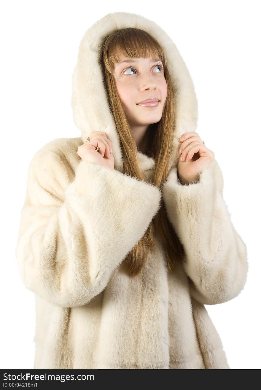 Pretty young girl in fur jacket. Isolate on white.