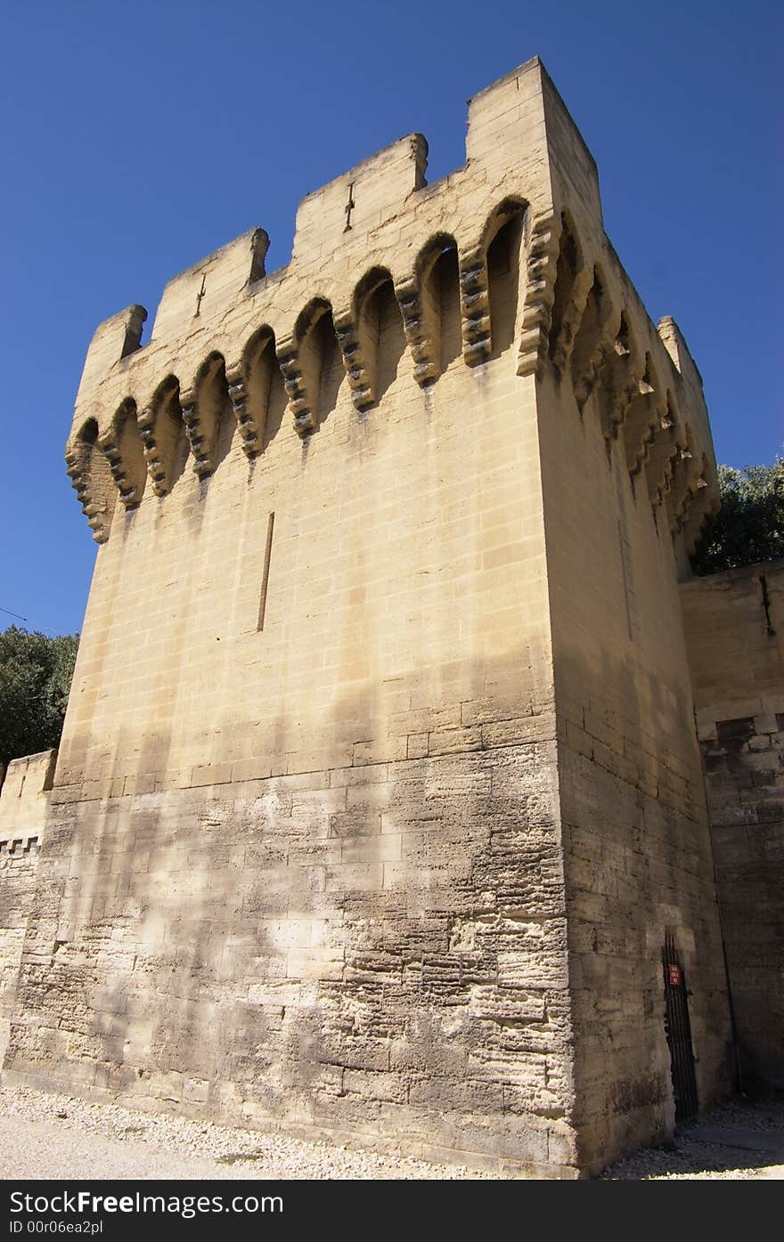 Medieval walls in town, down to top perspective vertical view. Avignon,  France, EU.