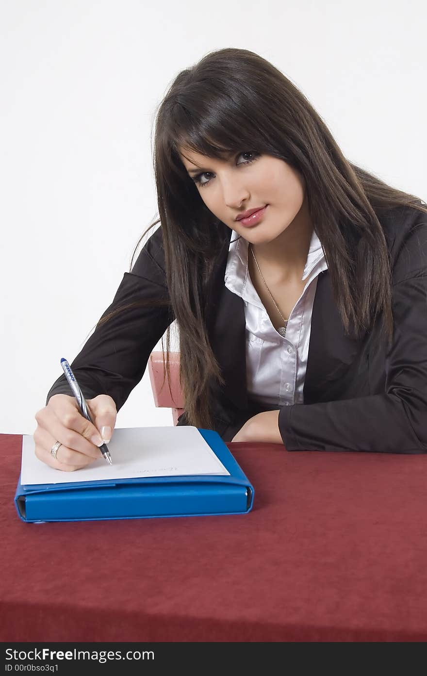 White pretty business woman posing in studio