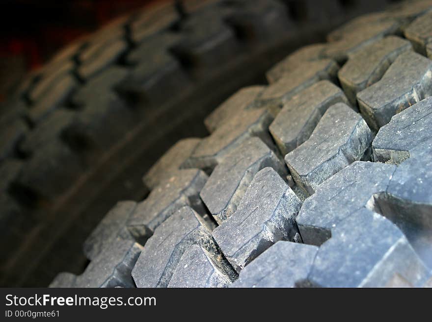 Two tires from a large truck as a close-up shot. Two tires from a large truck as a close-up shot.