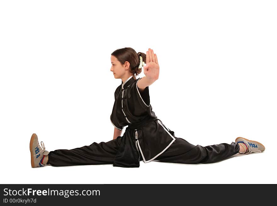 Wushu girl makes splits on white