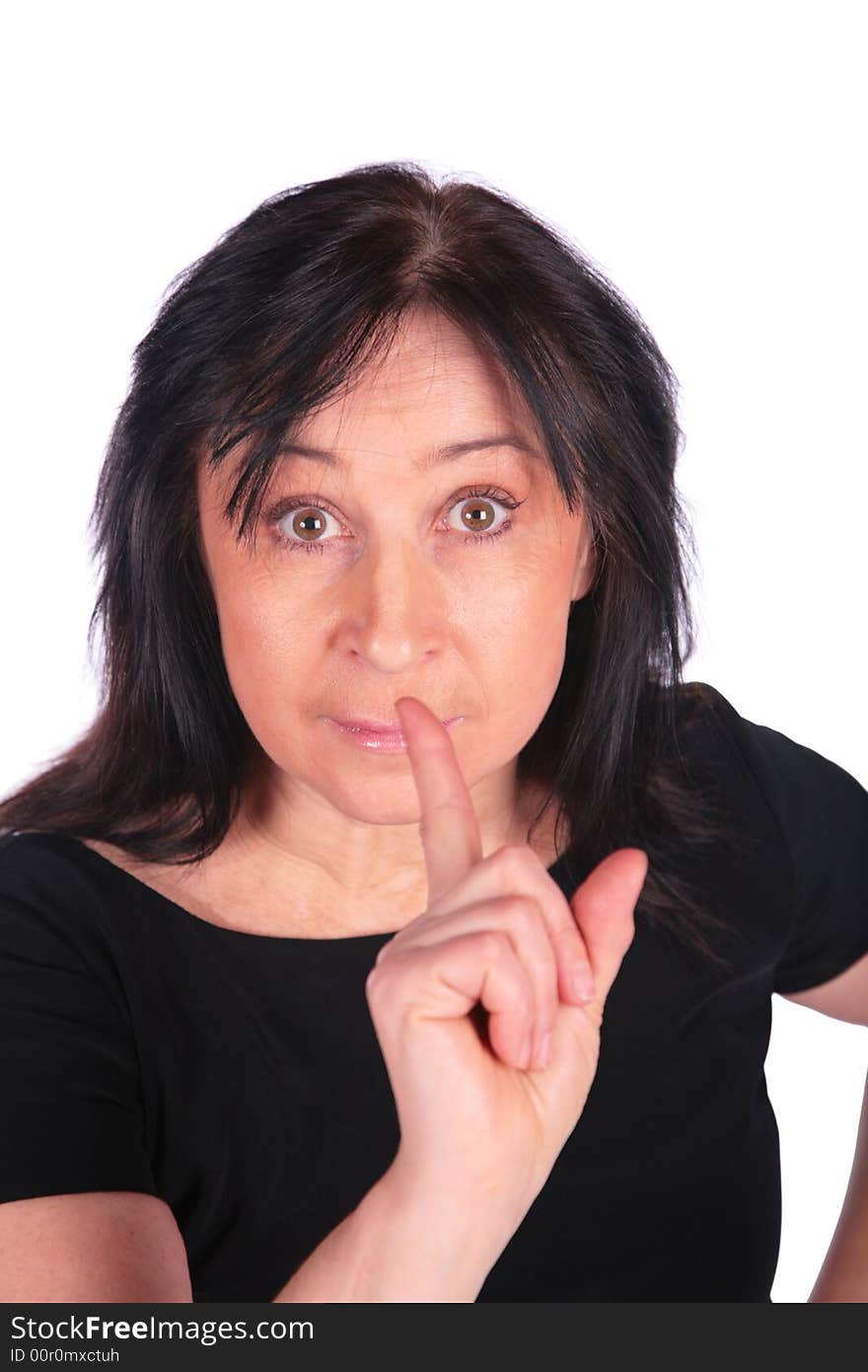 Woman in black gives gesture on white