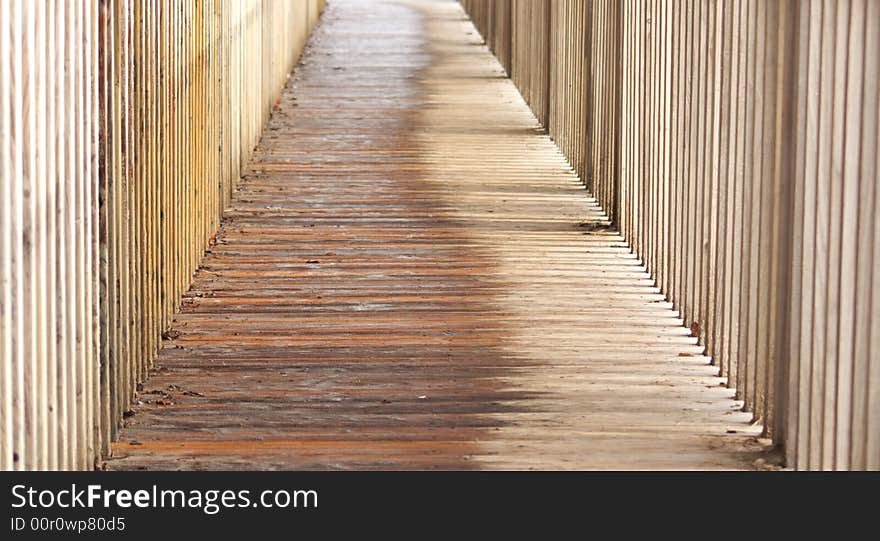 Wet wooden pavement in an agricultural building