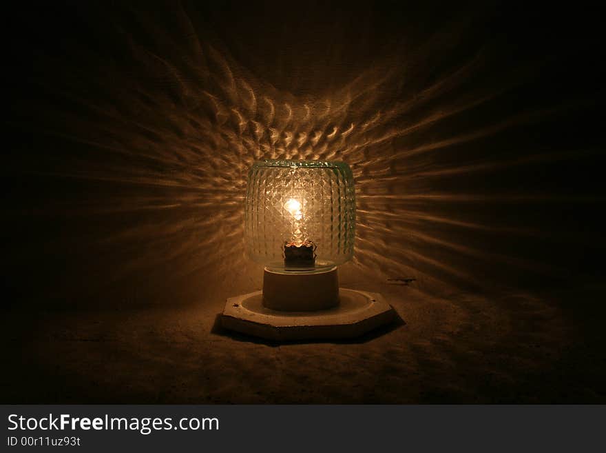 The photo of a lamp is interesting by the symmetry