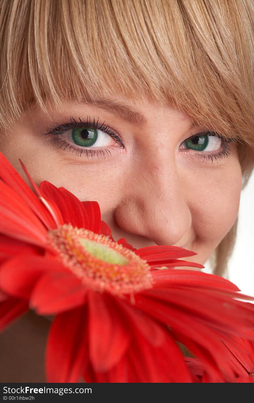 An image of nice girl with red flowers