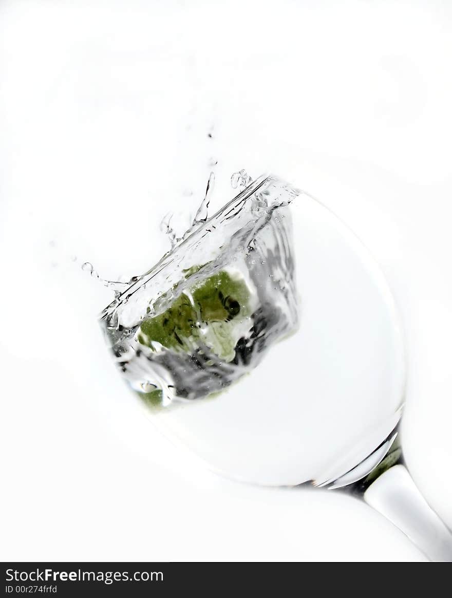 Water splash in glass isolated