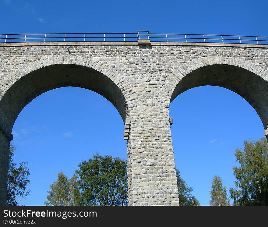 Two archs of a ancient stone railway bridge. Two archs of a ancient stone railway bridge