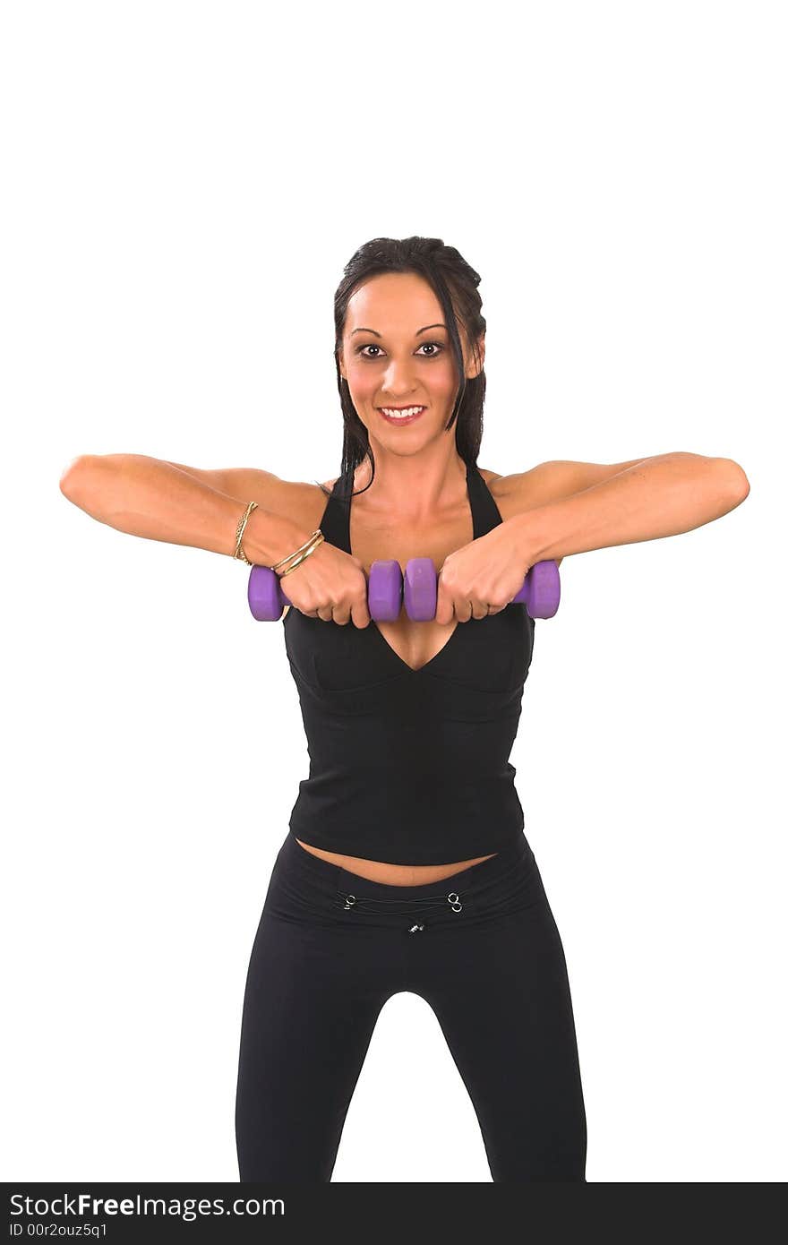 Middle aged lady is exercizing with puprle weights, she is enjoying her healthy lifestyle. Middle aged lady is exercizing with puprle weights, she is enjoying her healthy lifestyle