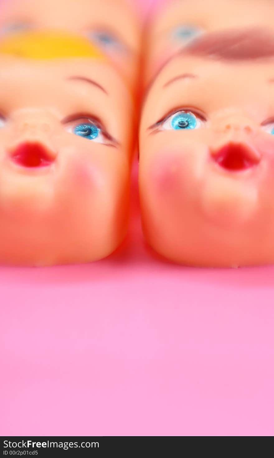 Artistic dreamy shot of doll factory faces. Artistic dreamy shot of doll factory faces