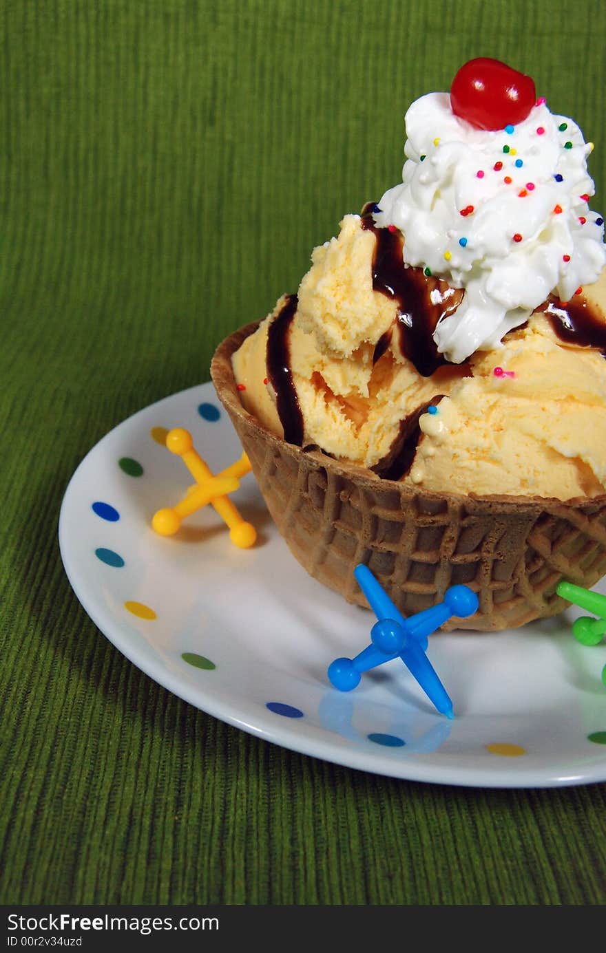 Waffle bowl with ice cream and whipped cream. Waffle bowl with ice cream and whipped cream.