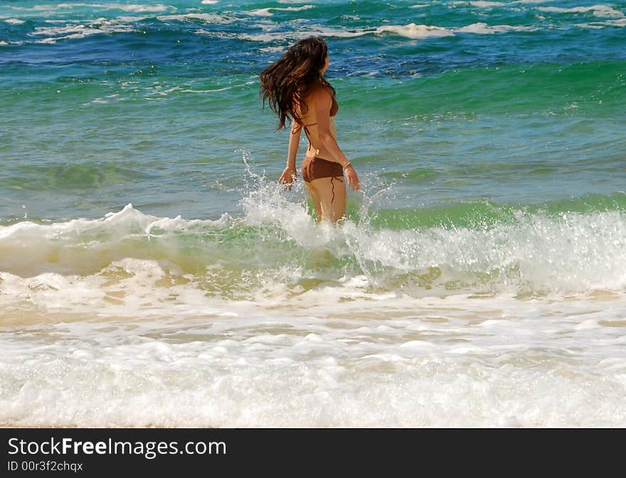 Girl Swimming on an Australian Beach