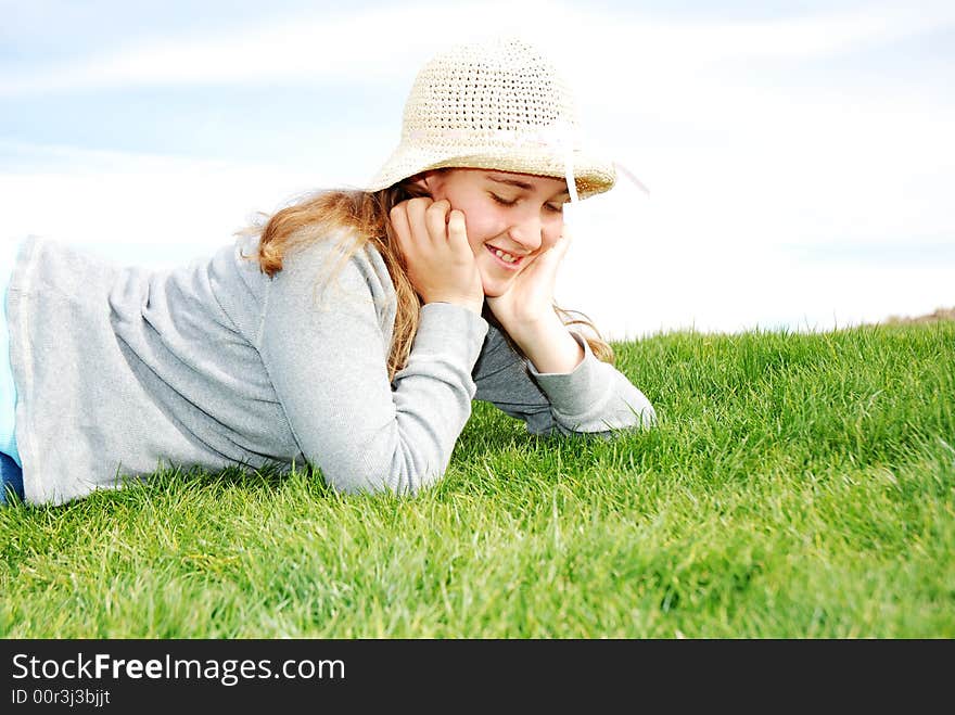 Young girl is enjoying herself at outdoor location