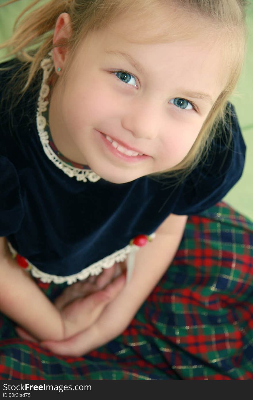 Close up of cute little girl in pretty black dress. Close up of cute little girl in pretty black dress.