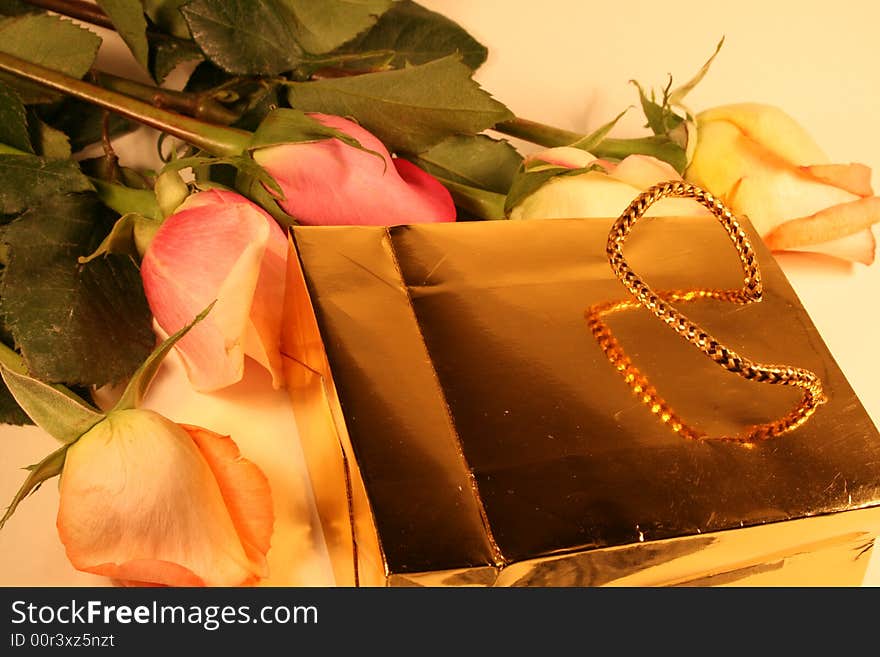 Gift bag in gold and roses. Gift bag in gold and roses