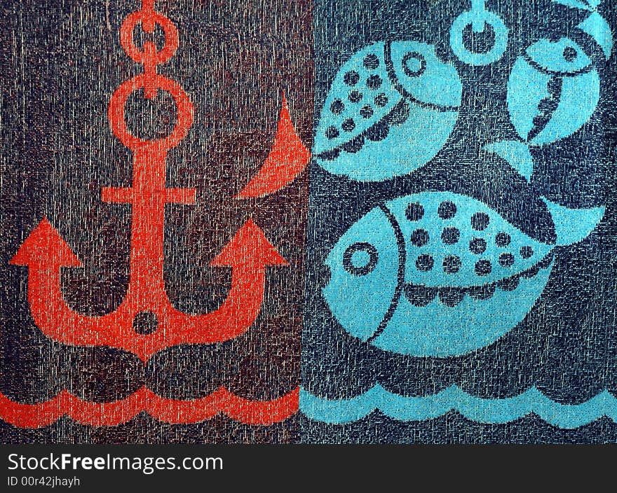 Detail of a child's bath towel with some fish and anchor