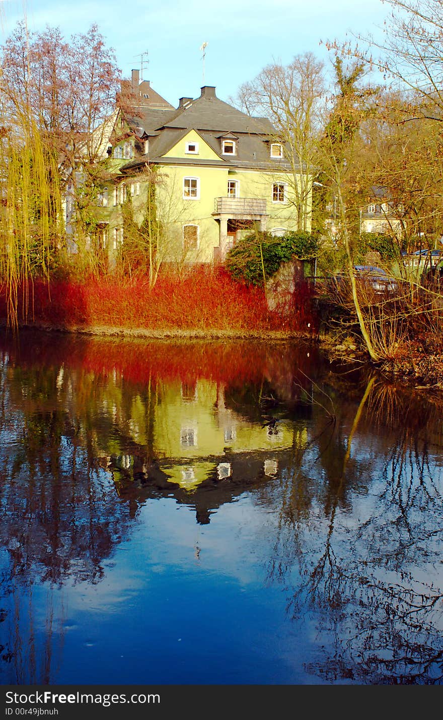 Reflection of a house in the Lahn river (near Frankfurt) in Germany.