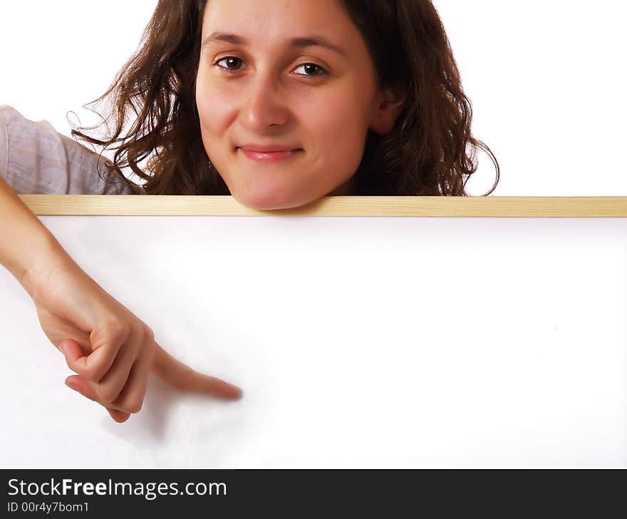 Young woman holding a white board