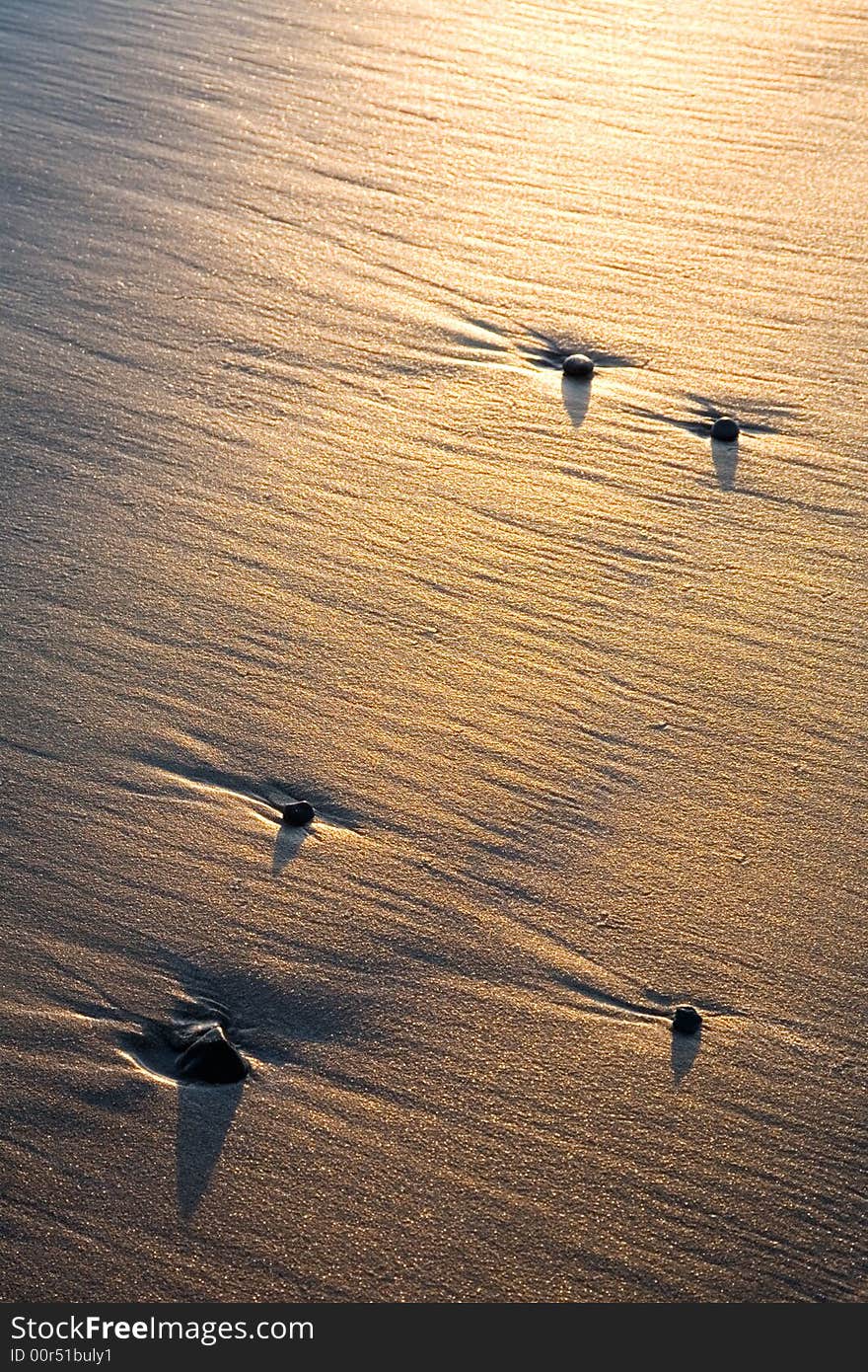 Wet sand on the beach